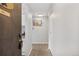 Hallway view into the home showcasing the neutral colors at 7375 E Quincy Ave # 204, Denver, CO 80237