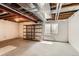 Unfinished basement showing utilities and room for storage, workbench or other hobby space at 511 Noel Ave, Longmont, CO 80501