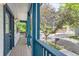 View from the porch showing the neighborhood street, landscaping, and house number at 511 Noel Ave, Longmont, CO 80501