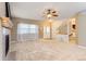Inviting living room features large windows, a decorative fireplace, and an open layout at 511 Noel Ave, Longmont, CO 80501