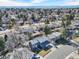 Charming home nestled in a desirable neighborhood with mature trees and mountain views at 15592 E Kenyon Ave, Aurora, CO 80013