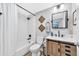 Updated bathroom featuring modern vanity, fixtures, and decor at 15592 E Kenyon Ave, Aurora, CO 80013