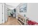 Bright entryway with console table leading to the office space at 15592 E Kenyon Ave, Aurora, CO 80013
