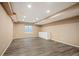 Spacious finished basement with recessed lighting and vinyl flooring at 15577 Greenstone Cir, Parker, CO 80134