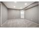 Basement with neutral paint, carpet and recessed lighting at 15577 Greenstone Cir, Parker, CO 80134