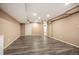 Spacious finished basement with recessed lighting and vinyl flooring at 15577 Greenstone Cir, Parker, CO 80134