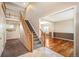Grand entryway features staircase, tile floors, and access to living areas at 15577 Greenstone Cir, Parker, CO 80134
