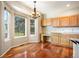 Eat-in kitchen featuring a work desk, and an oversized bay window with outdoor views at 15577 Greenstone Cir, Parker, CO 80134