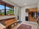 Stylish entryway with a bench, ample storage, and natural light streaming through the window at 1880 W 32Nd Ave, Denver, CO 80211