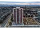 High-rise apartment building in an urban area with city skyline at 3131 E Alameda Ave # 2102, Denver, CO 80209