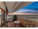 Spacious balcony offering panoramic city views and a cozy seating area at 3131 E Alameda Ave # 2102, Denver, CO 80209