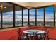 Bright sun room with panoramic city views, modern furniture, and comfortable seating at 3131 E Alameda Ave # 2102, Denver, CO 80209