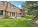 Full exterior view showcasing the townhome's architecture and landscaping at 12931 W 20Th Ave, Golden, CO 80401