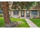 Charming townhome exterior with well-maintained lawn and inviting walkway at 12931 W 20Th Ave, Golden, CO 80401