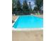 Enjoy the community pool with refreshing turquoise water and lounge chairs at 12931 W 20Th Ave, Golden, CO 80401