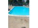 Enjoy the community pool with refreshing turquoise water and lounge chairs at 12931 W 20Th Ave, Golden, CO 80401