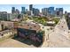 Urban building featuring a unique mural, rooftop terrace, and downtown skyline views at 2400 N Broadway # 4, Denver, CO 80205