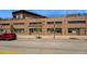 Modern commercial building with architectural details, street view, and parking at 2400 N Broadway # 4, Denver, CO 80205