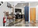 Cozy kitchen showcasing stainless steel appliances, dark cabinetry, and unique wood-style flooring at 2400 N Broadway # 4, Denver, CO 80205