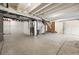 Unfinished basement offering ample space and potential for customization to suit various needs at 5779 Piney River Pl, Brighton, CO 80601