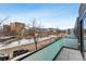 Private balcony overlooking the street and distant mountains at 2471 Walnut St, Boulder, CO 80302