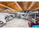 Unfinished basement with HVAC and ample storage space at 2471 Walnut St, Boulder, CO 80302