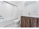 Clean bathroom with white subway tiles and wood vanity at 2471 Walnut St, Boulder, CO 80302