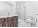 Modern bathroom with a walk-in shower and updated vanity at 2471 Walnut St, Boulder, CO 80302