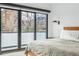 Bedroom with sliding glass doors and mountain views at 2471 Walnut St, Boulder, CO 80302