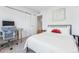 Small bedroom with a desk and sliding barn door at 2471 Walnut St, Boulder, CO 80302