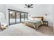 Spacious bedroom with sliding glass doors leading to balcony at 2471 Walnut St, Boulder, CO 80302