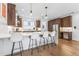 Modern kitchen with island and breakfast bar, stainless steel appliances at 2471 Walnut St, Boulder, CO 80302