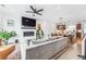 Open living room with fireplace and kitchen view at 2471 Walnut St, Boulder, CO 80302