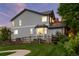 A spacious backyard featuring a lush lawn and partial fence, perfect for outdoor activities at 5984 S Paris Pl, Greenwood Village, CO 80111
