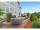 An inviting backyard patio features a seating area, manicured landscaping, and a serene outdoor ambiance at 5984 S Paris Pl, Greenwood Village, CO 80111
