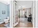 Half bath connected to a home office, featuring modern fixtures and a clean design at 5984 S Paris Pl, Greenwood Village, CO 80111