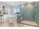 Bathroom with tiled floors, freestanding tub, a tiled shower, and bright windows at 5984 S Paris Pl, Greenwood Village, CO 80111