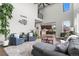 Spacious living room showcasing an open floor plan, high ceilings, and comfortable furnishings at 5984 S Paris Pl, Greenwood Village, CO 80111