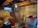 Unfinished basement with exposed beams, concrete walls, and available space at 1000 Denver Ave, Fort Lupton, CO 80621
