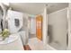 Bathroom with walk-in shower and updated fixtures at 31819 Rocky Village Dr # 216, Evergreen, CO 80439