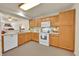 Bright kitchen featuring ample counter space and cabinets at 31819 Rocky Village Dr # 216, Evergreen, CO 80439