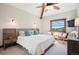 Inviting bedroom with vaulted ceilings, beam and nature views at 33448 Alta Vista Dr, Evergreen, CO 80439