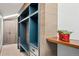 A custom closet with built-in shelves and drawers offers stylish storage solutions at 33448 Alta Vista Dr, Evergreen, CO 80439