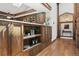 Custom wood cabinetry, open shelving, and modern fixtures make this a gourmet's delight at 33448 Alta Vista Dr, Evergreen, CO 80439