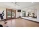 Spacious workout room with ample natural light, mirrors, and exercise equipment for a home fitness experience at 33448 Alta Vista Dr, Evergreen, CO 80439