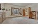 Bright and airy living room with a large bay window, offering ample natural light and views of the outside at 18470 Canterbury Dr, Monument, CO 80132