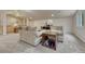 Comfortable living room area with soft lighting, plush sofas, and convenient side table with extra storage space at 18470 Canterbury Dr, Monument, CO 80132