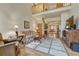 Cozy living room featuring wood floors, comfortable seating, and lots of natural light at 18470 Canterbury Dr, Monument, CO 80132