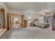 Spacious main bedroom with French doors to the living area and doors to the outside, creating a seamless flow at 18470 Canterbury Dr, Monument, CO 80132