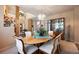 Formal dining room featuring a large table, display cabinet and decorative lighting at 23 Hess Ave, Golden, CO 80401